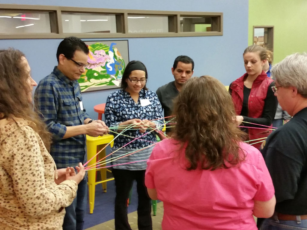 ELEVATE couples engaged in bonding exercise